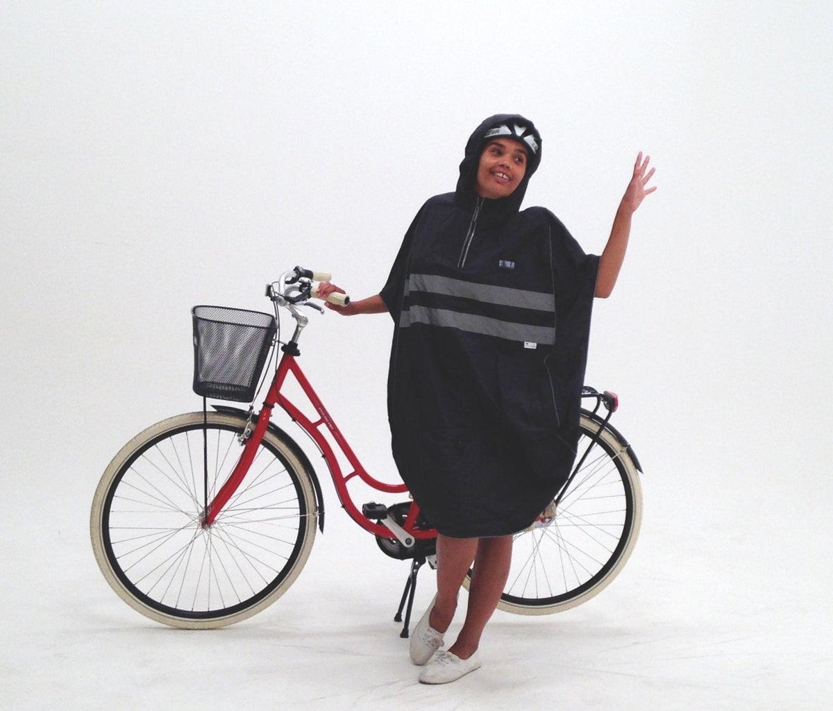 Cycling poncho and waterproof rain jacket compared for commuting in rain