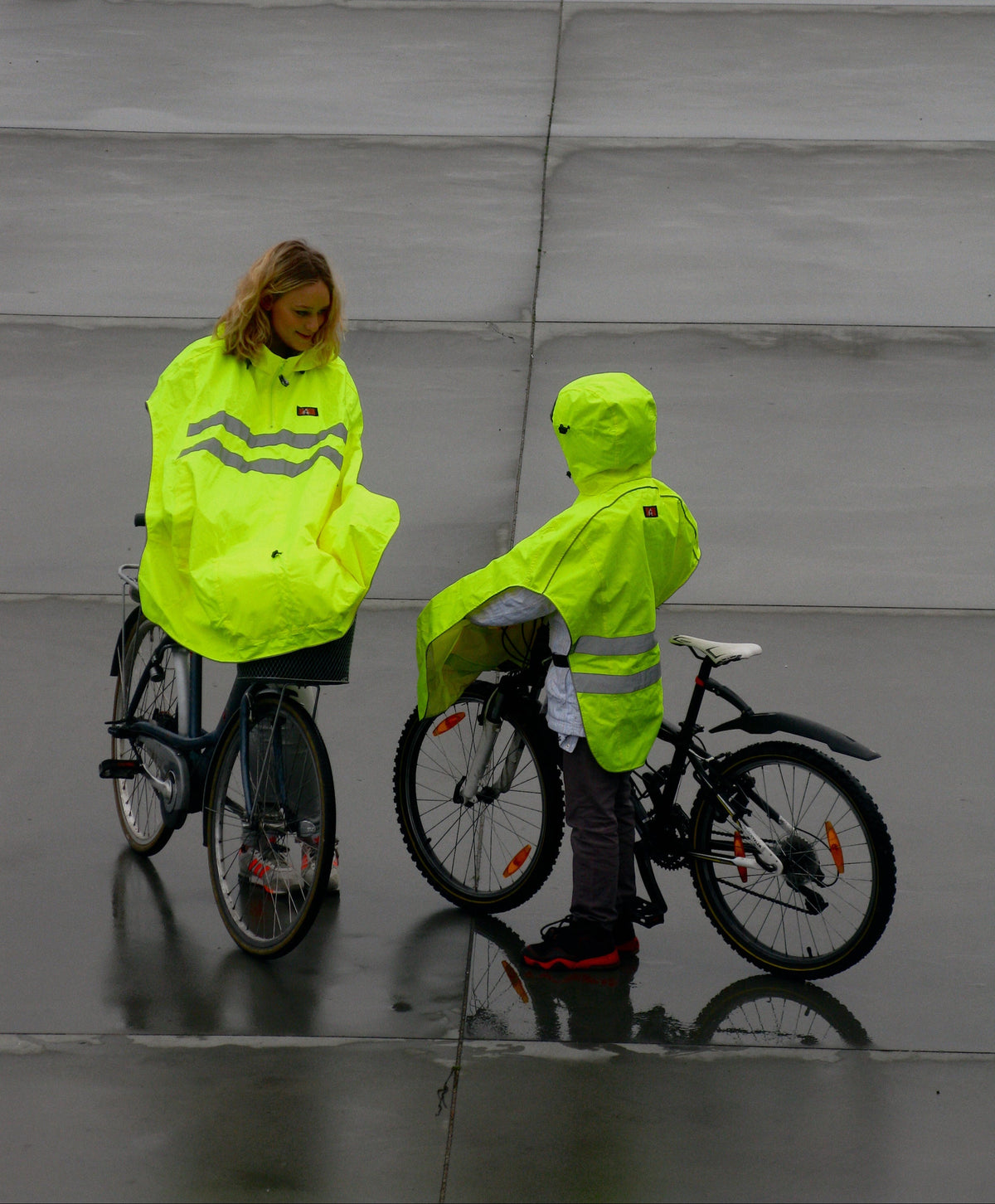 Waterproof cycling rainwear being tested for water resistance