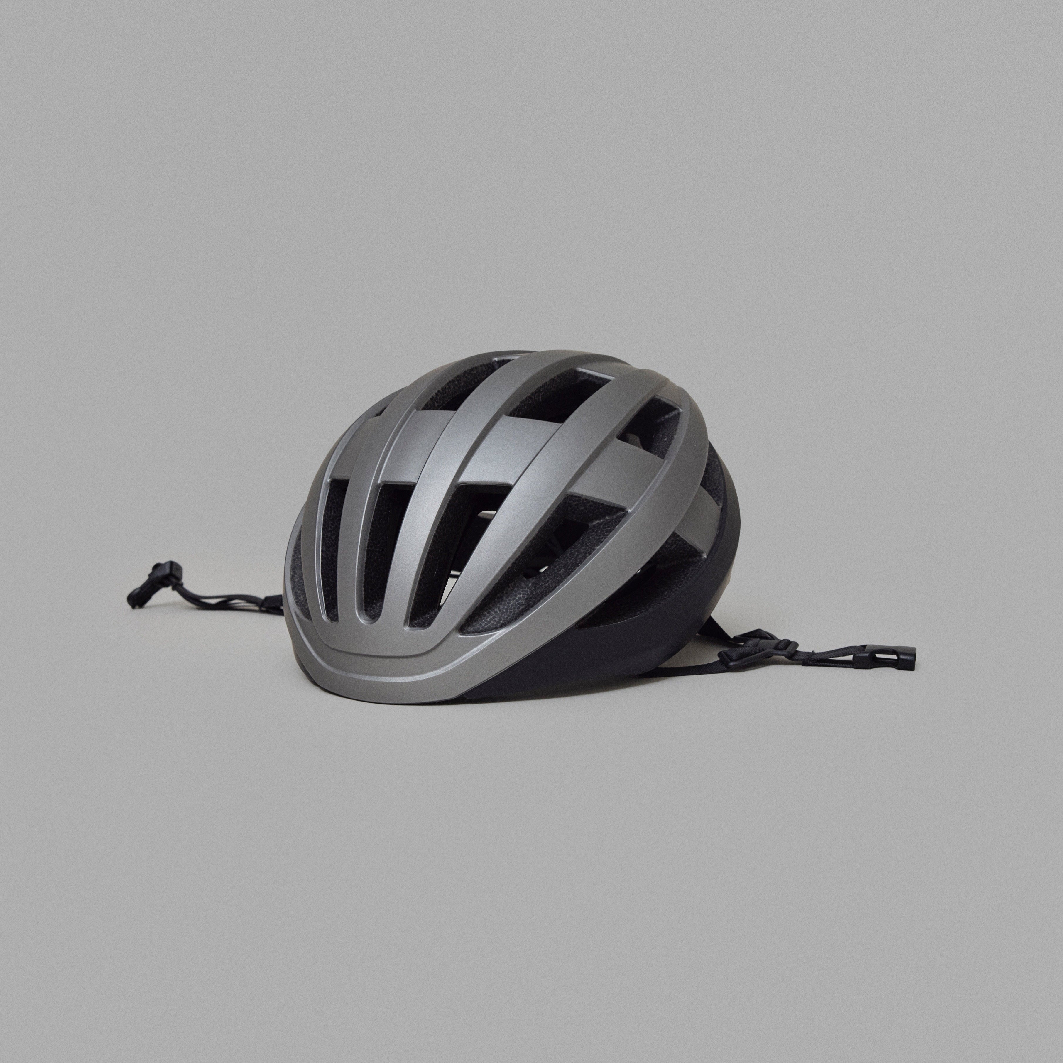 NoRain bicycle helmet on a gray background