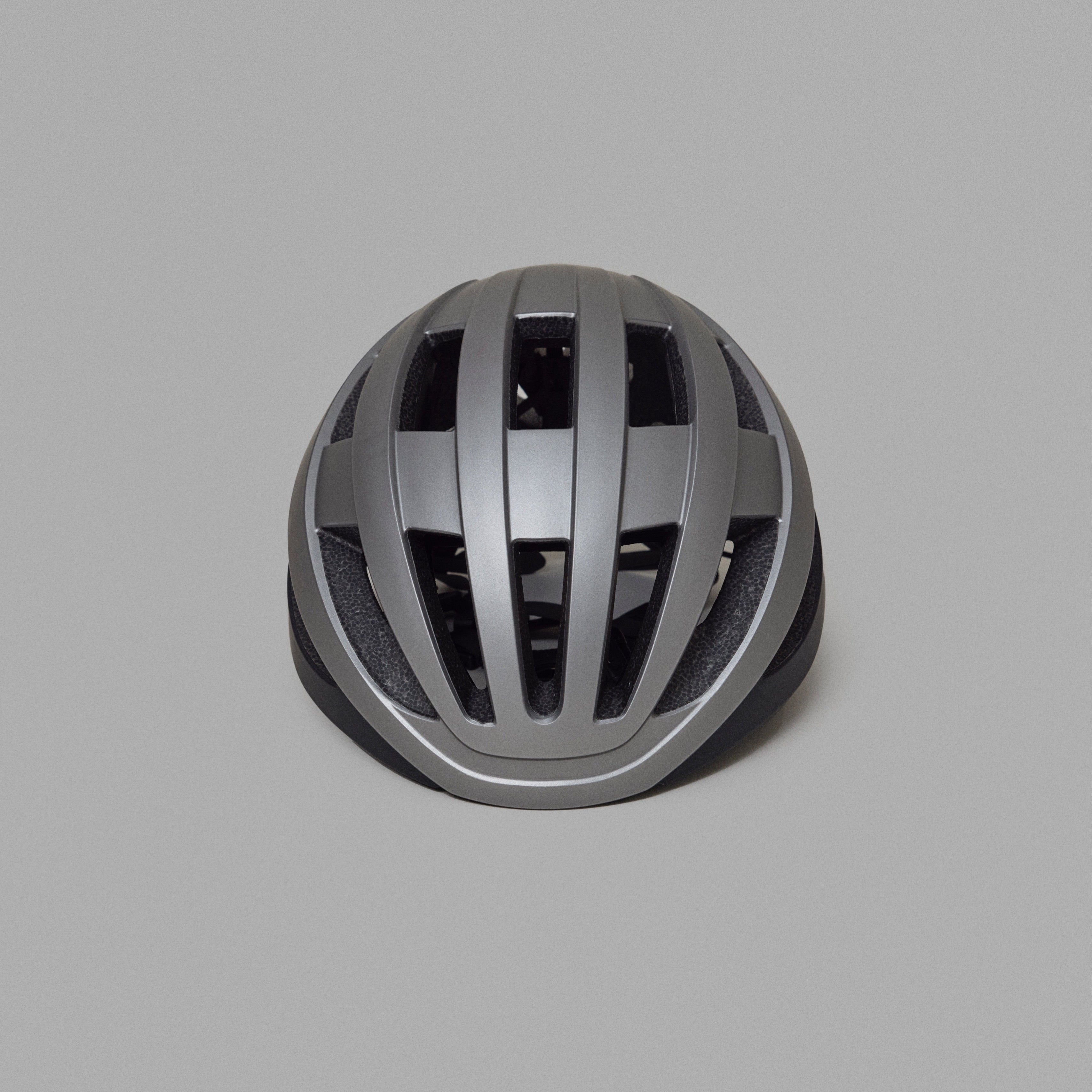 Gray NoRain Bicycle helmet on a gray background